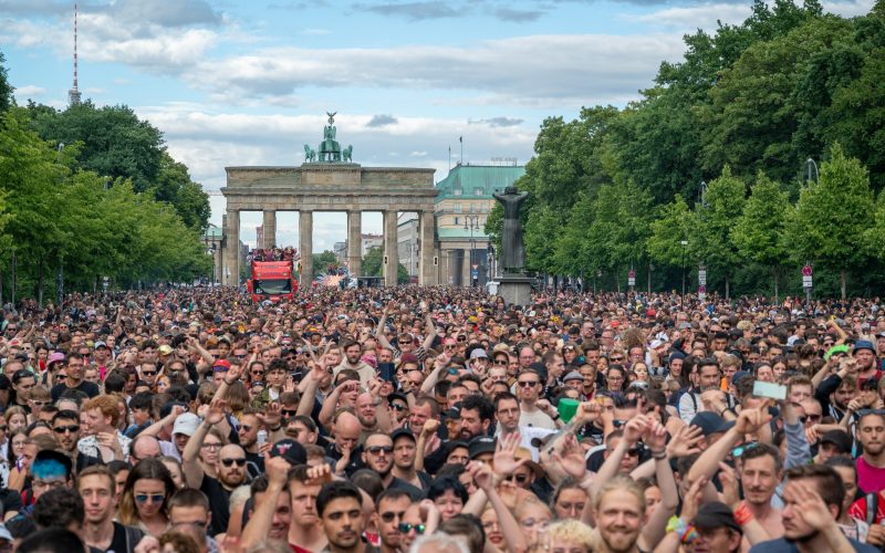 Hundreds of people marching during Rave the Planet 2023 in Berlin, Germany