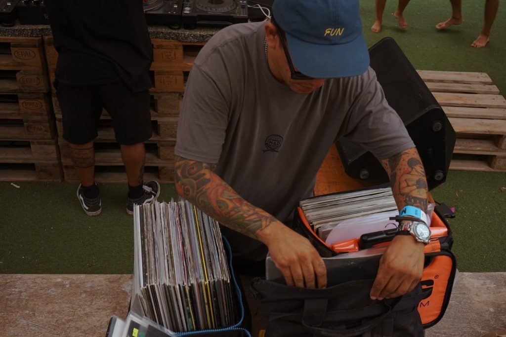 DJ selecting vinyls during MEF Fest Mallorca in Mallorca, Spain