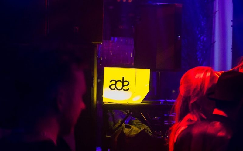 Yellow lightning sign with the words ADE 2023 for Amsterdam Dance Event