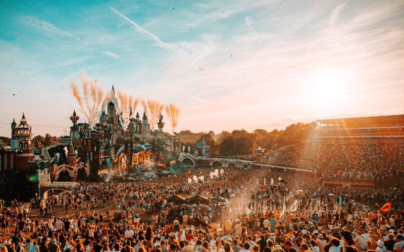 Mainstage of Tomorrowland with huge crowd of people during the sunset