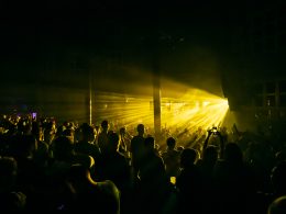 Crowd under yellow lights at ADE 2023
