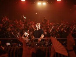 Marco Carola performing in front of a packed crowd
