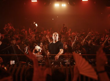 Marco Carola performing in front of a packed crowd