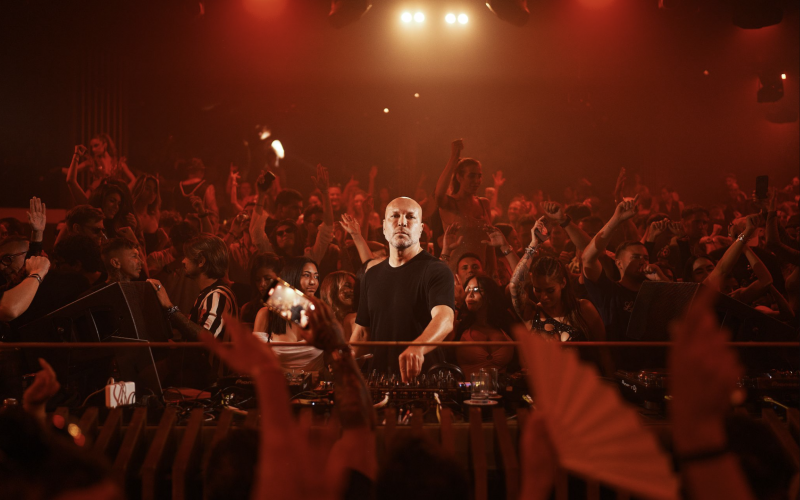 Marco Carola performing in front of a packed crowd