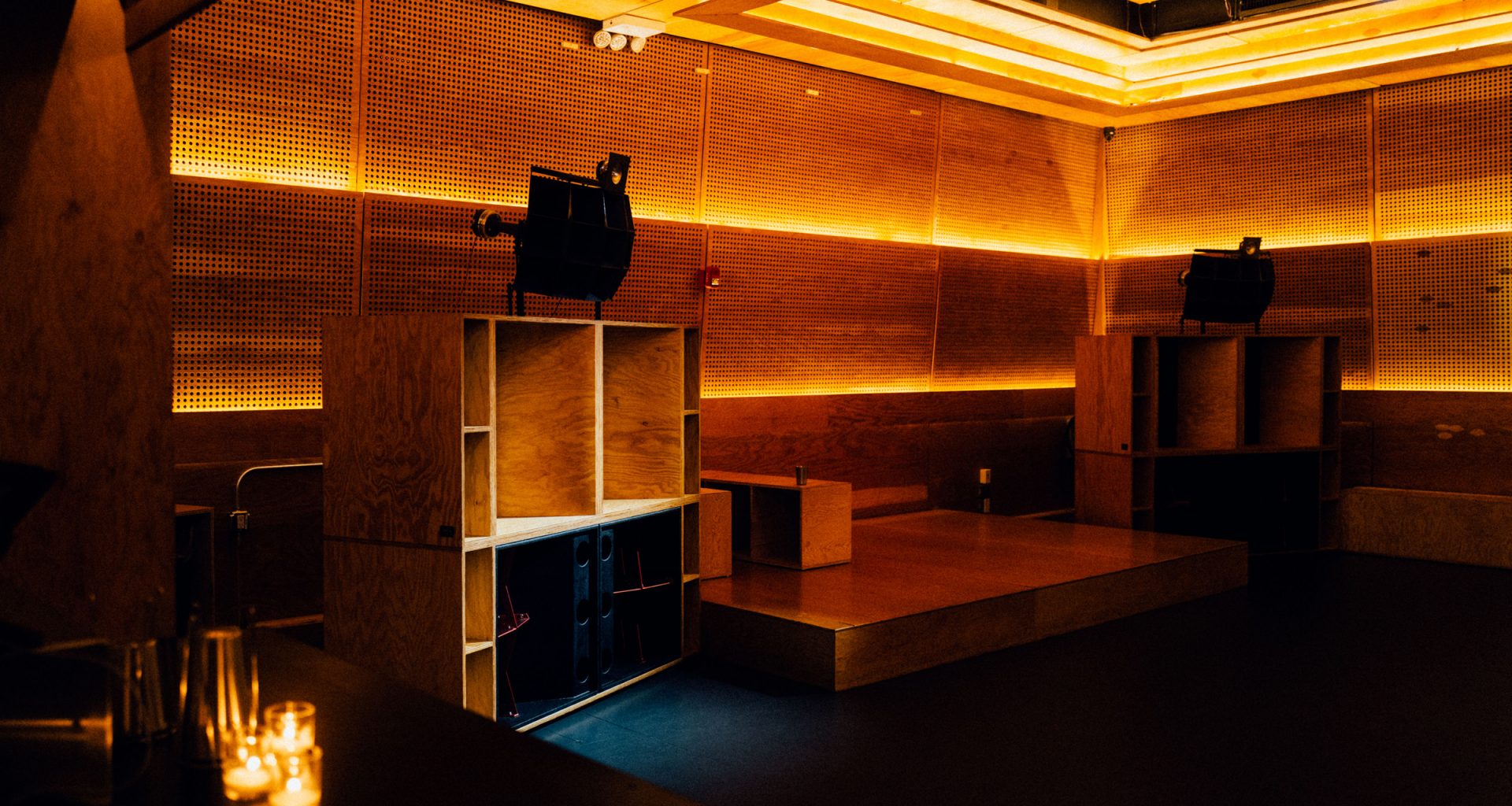 The Sound Room at Public Records Brooklyn, showcasing its hi-fi sound system and acoustic design in an empty, minimalist setting.