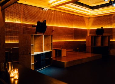 The Sound Room at Public Records Brooklyn, showcasing its hi-fi sound system and acoustic design in an empty, minimalist setting.