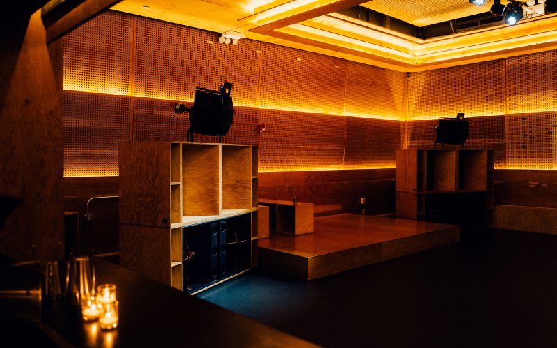 The Sound Room at Public Records Brooklyn, showcasing its hi-fi sound system and acoustic design in an empty, minimalist setting.