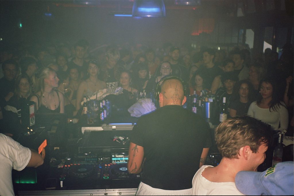 MCR-T playing a DJ set in a club in Hamburg