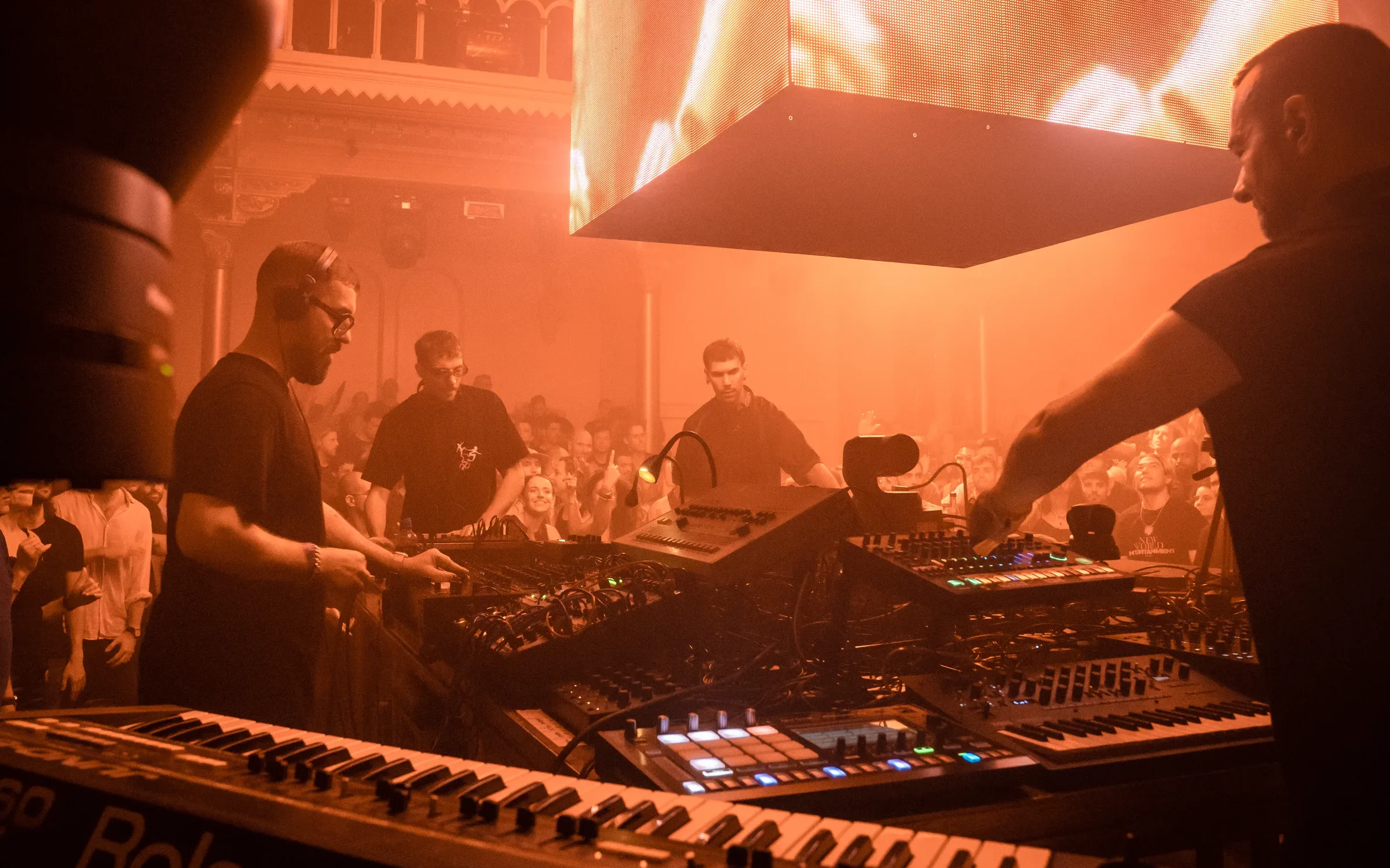 Stoor Lab at Amsterdam Dance Event 2025, djs playing analog under an orange dim lightning