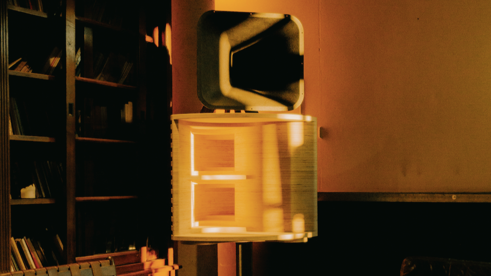 A design speaker inside a dim-lighted room of a hi-fi bar
