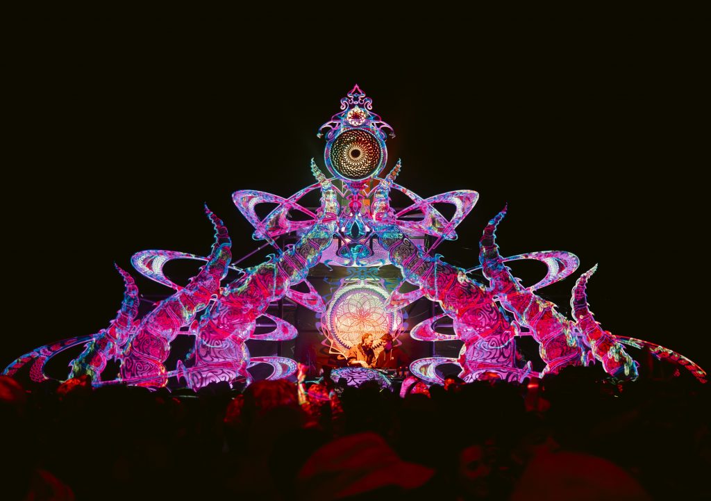 Beyond The Mountain neon-lit stage designed by
