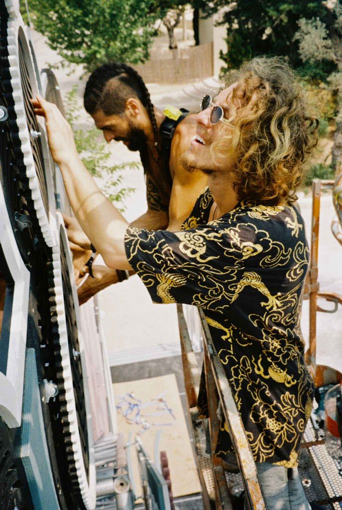 Florain Göerlitz, co-founder of Beyond The Mountain Festival, helping build the stage