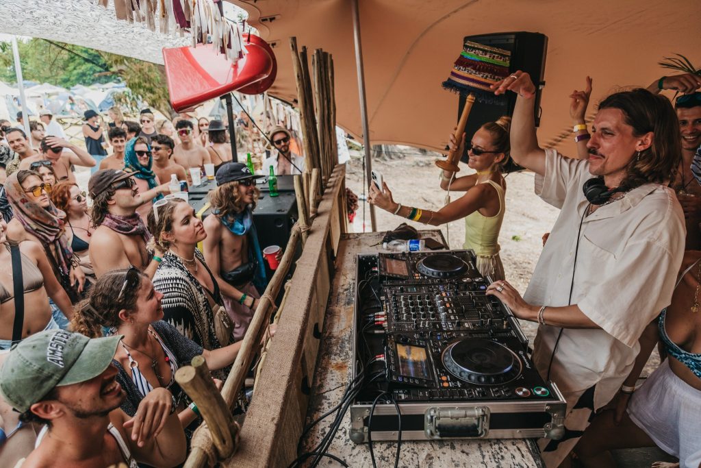Rumours By The Lake 2025, DJ spinning tunes in front of happy crowd