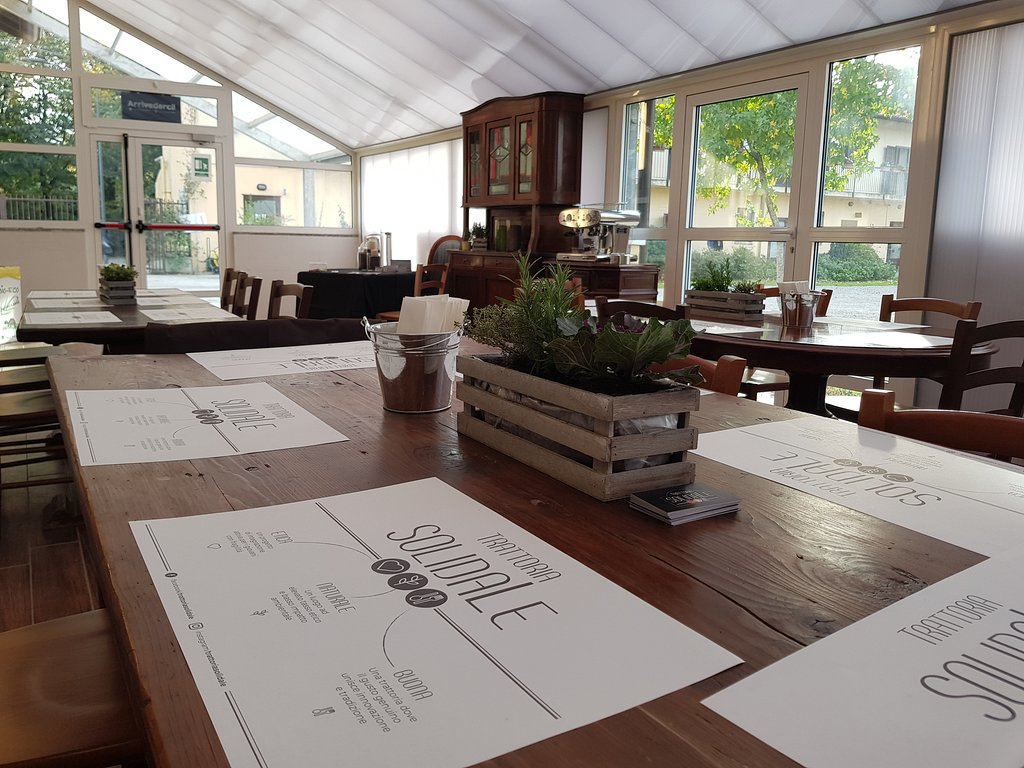 Trattoria Solidale Biblioteca gallery image